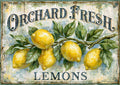 Distressed painted sign depicting a lemon branch with green leaves and ornate 'Orchard Fresh' and 'Lemons' lettering.