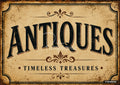 Vintage sign with "ANTIQUES" in arched black text, "TIMELESS TREASURES" below, on a crackled tan background with ornate brown borders.