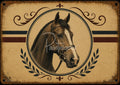 Engraved horse head in bridle inside circular vintage frame with laurel leaves and scrolls on tan textured background.