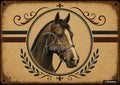 Beige artwork with a horse's head in a circular frame, adorned with laurels and fleur-de-lis motifs.