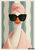 Close-up of a white duck wearing large black sunglasses, a pink head towel, and a pink bath wrap.