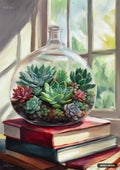 A glass terrarium with an assortment of succulents sits atop a stack of books by a sunlit window.